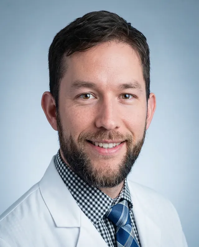 John De Caro, MD